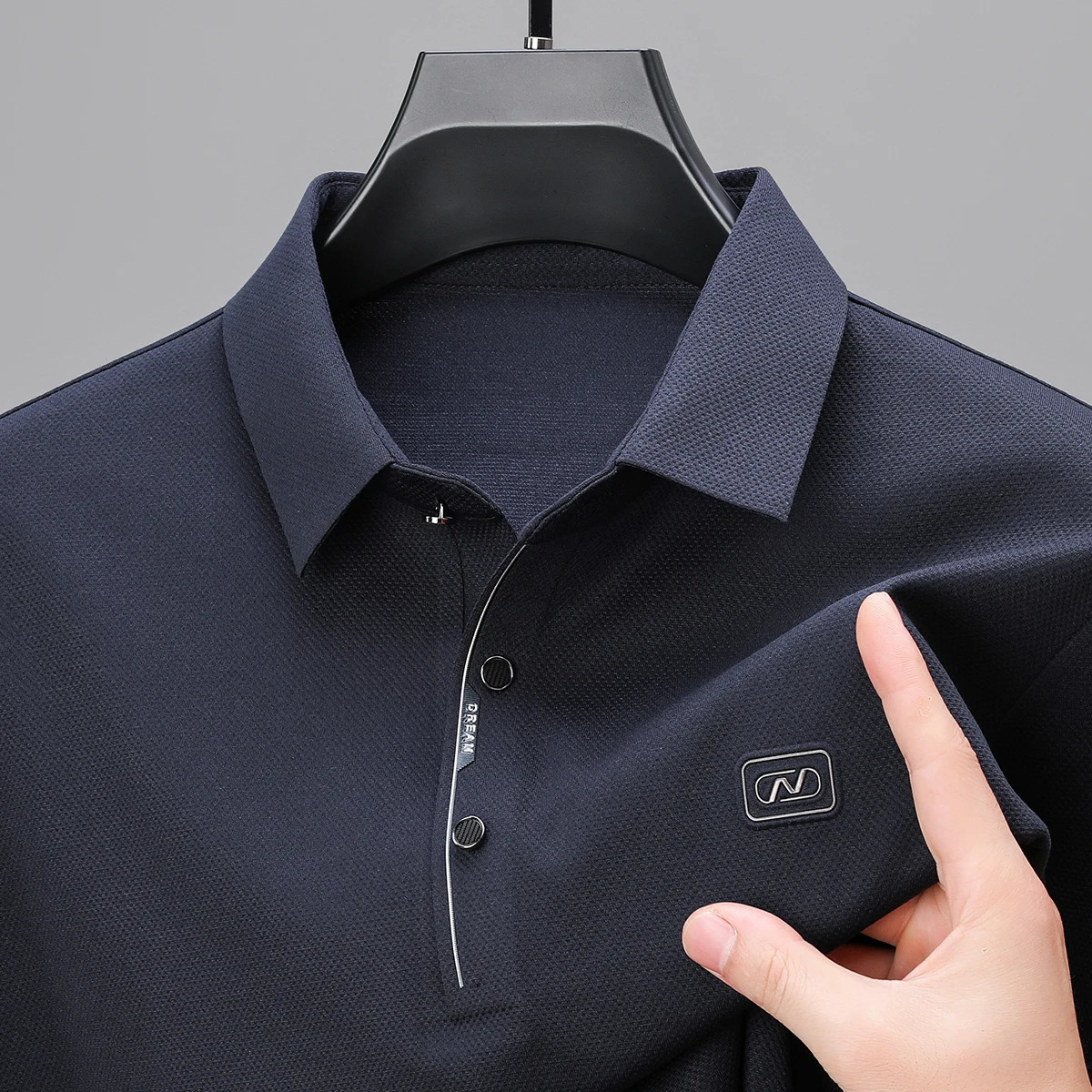 Spring and Autumn ice silk seamless long sleeved high-end mens polo shirt fashionable embossed casual T-shirt 250526