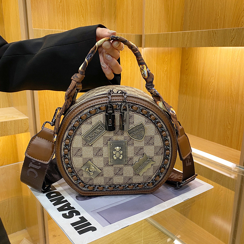High end fashion womens small round bag 2025 new printed handbag casual versatile single shoulder diagonal cross bag