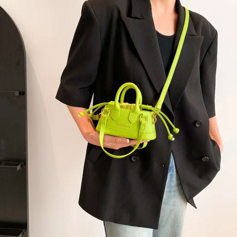 2025 new fashionable drawstring girl one-piece new splicing designer women's handbag simple mini girl shoulder bag niche design shell bag car sew