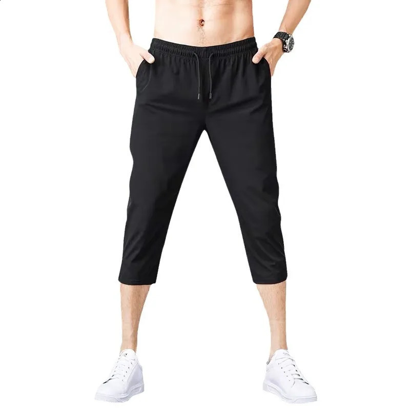 2025 Summer Mens Shorts Breathable Stretched Nylon Ice Silk 3/4 Short Capris Pants Sports Breeches Plus Size Casual Shorts Male 250530