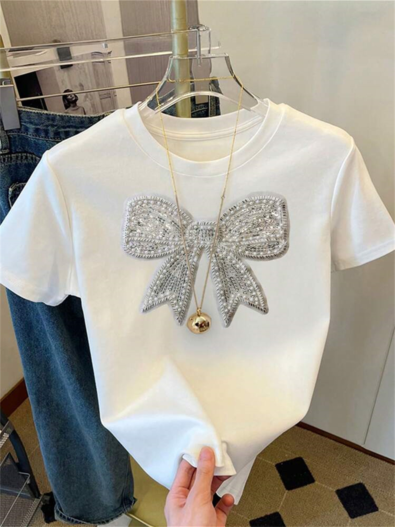 Designer T Shirt European And American Summer New Women S Fashion Cross Border Trade Casual Commuter Loose Round Neck Bow Print T Shirt Short Essentia