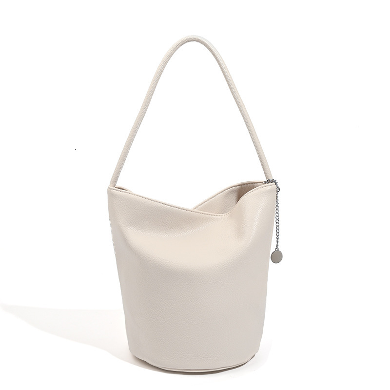 designer 2025 New Korean Niche INS Litchi Grain Soft Leather Simple Bucket Bag Fashion Versatile Shoulder Underarm Bag for Women