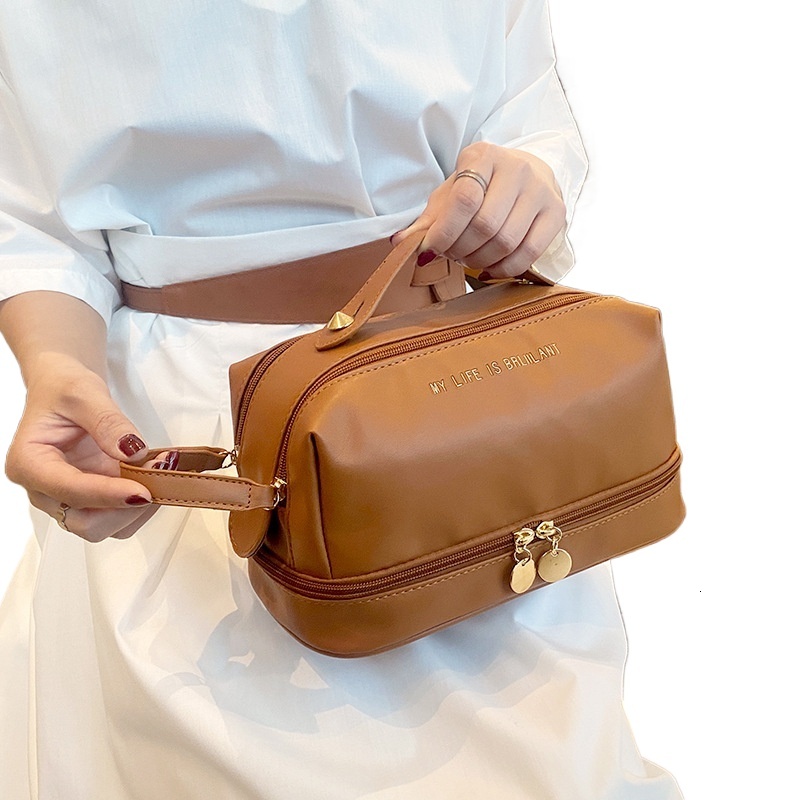 designer 2025 New PU Leather Handheld Makeup Bag Large Capacity Divider Board Skincare Storage Bag Simple Waterproof To