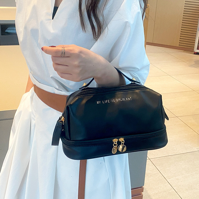 designer 2025 New PU Leather Handheld Makeup Bag Large Capacity Divider Board Skincare Storage Bag Simple Waterproof Toiletry Bag