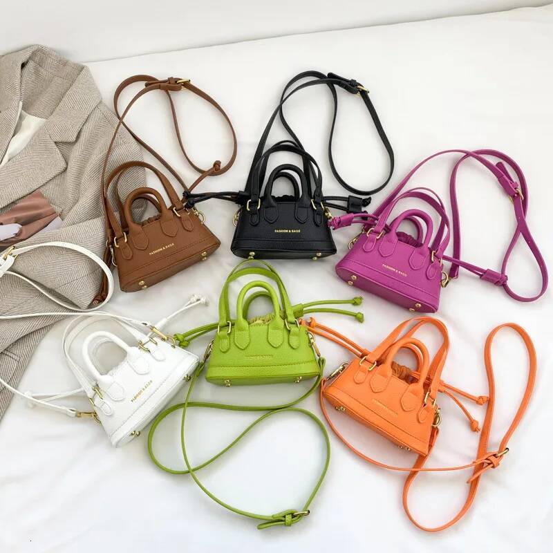 2025 new fashionable drawstring girl one-piece new splicing designer women's handbag simple mini girl shoulder bag niche design shell bag car sew