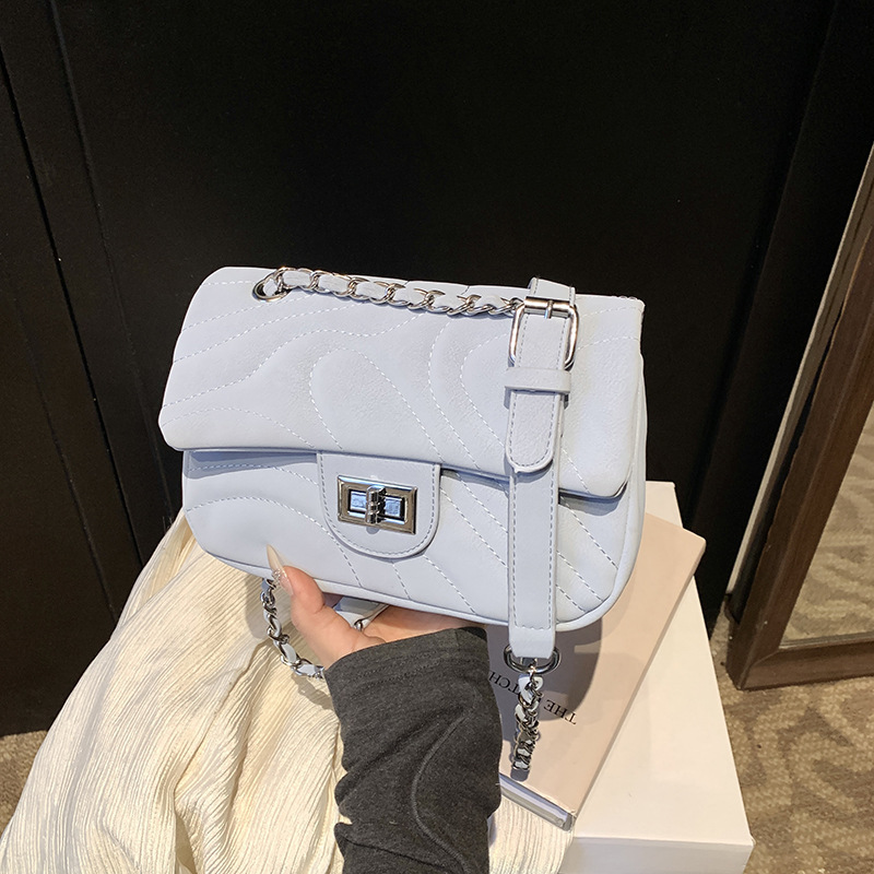 Free Shipping 2025 New High-end Versatile Underarm Bag Designer Bag Beach Bag Small Chanel Style Striped Commuter Shoulder Bag Chain Texture Crossbody