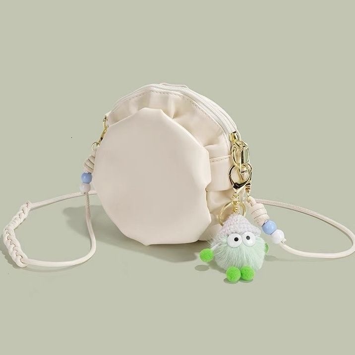 Cute girl fashion pleated leather small round bag for women s summer new single fashion shoulder crossbody bag designer women s single shoulder bag