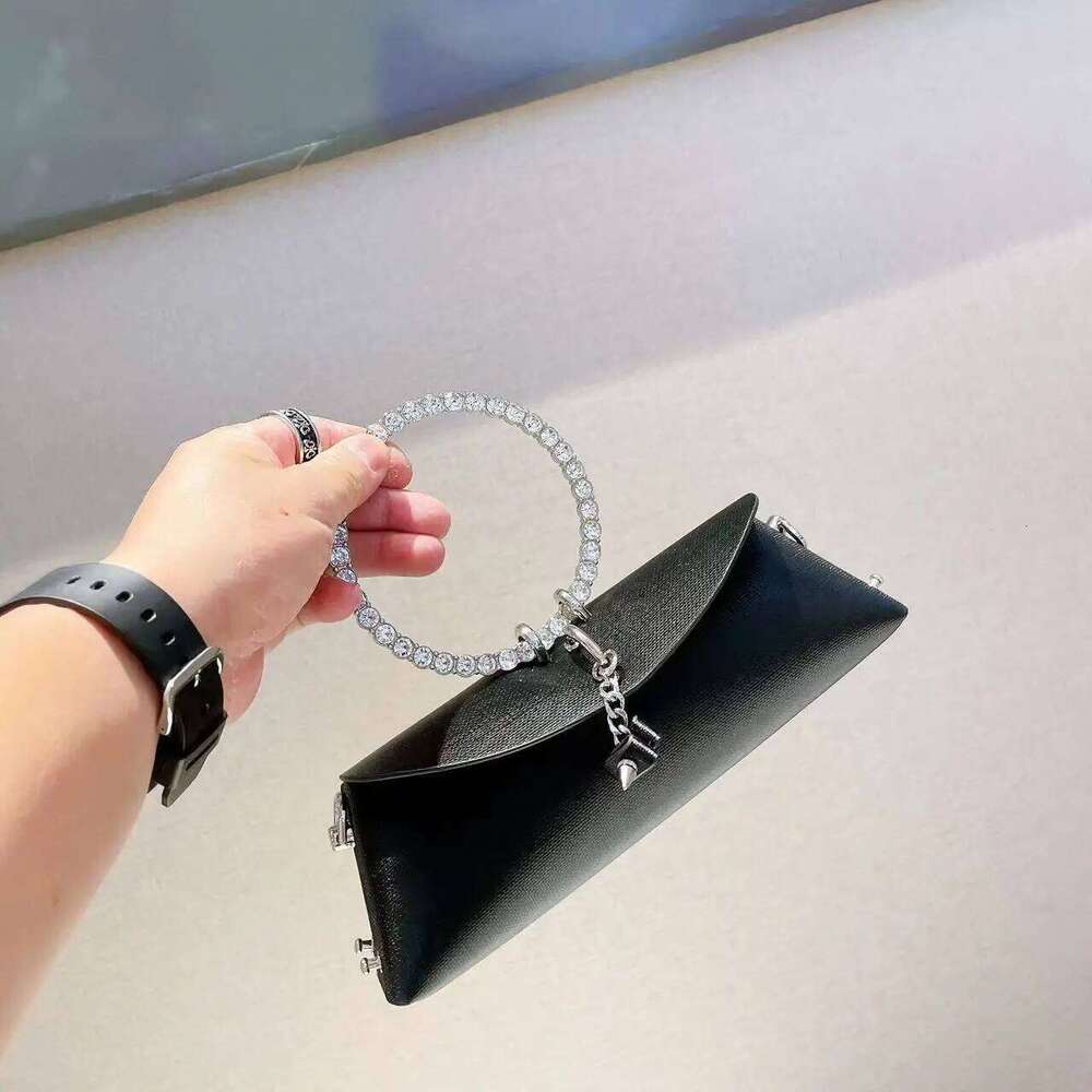 Designer Luxury Fashion French Personalized Clutch Designer Handbag 2025 Chain Ring Handle PU Leather Makeup Women's Bag Backpack