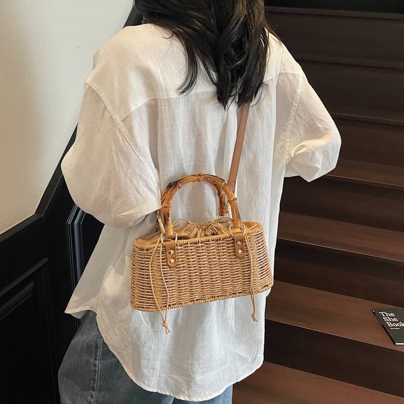 2025 New Summer Handmade Women's Vine Weaving Handbag Retro Bamboo Handle Handbag Designer Women's Bohemian Straw Weaving Beach Shoulder Bag