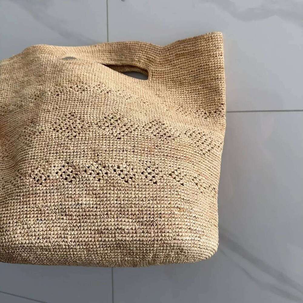 2025 New Summer Fashion Hollow Natural Lafite Grass fashion Women Tote Bag High Quality Designer Style Handbag