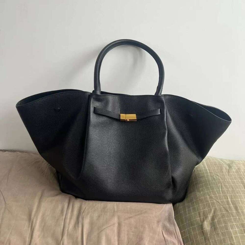 2025 Capacity Wing Bags High-End Leather Dumpling Shape Design Large Shoulder Slanting Cross New Ladies Handbags
