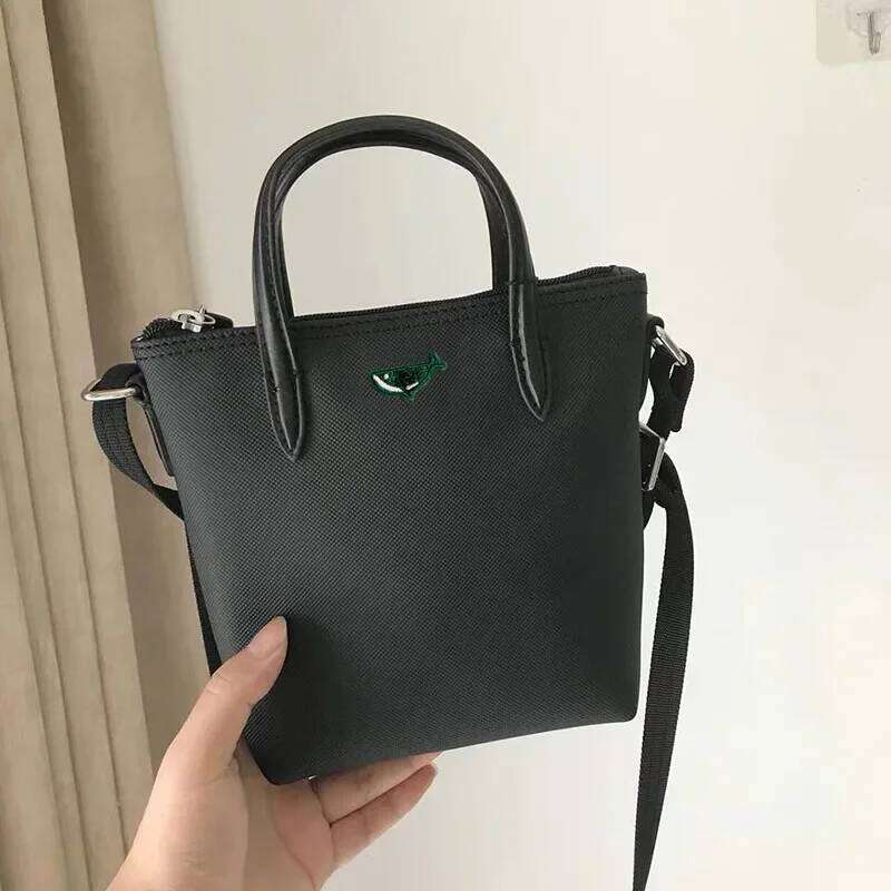Mini French New Short Handle Mobile Phone Women's Single Shoulder Slant Cross Dumpling Small Tote Bag