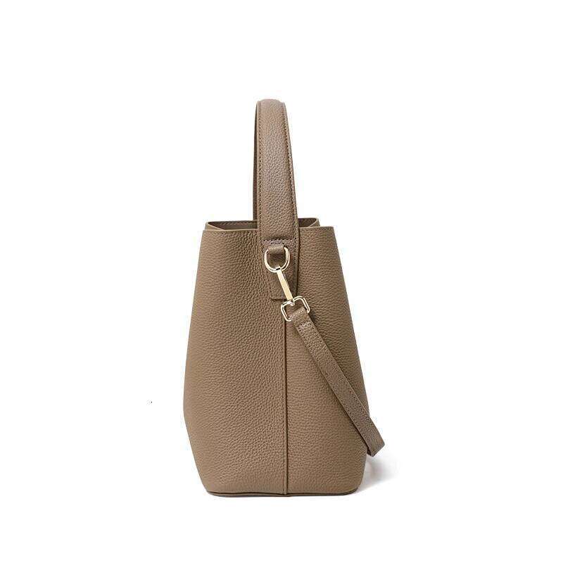 Elegant retro hand-carried water bucket top layer cowhide multi-layered strap lock tote bag single shoulder cross-body