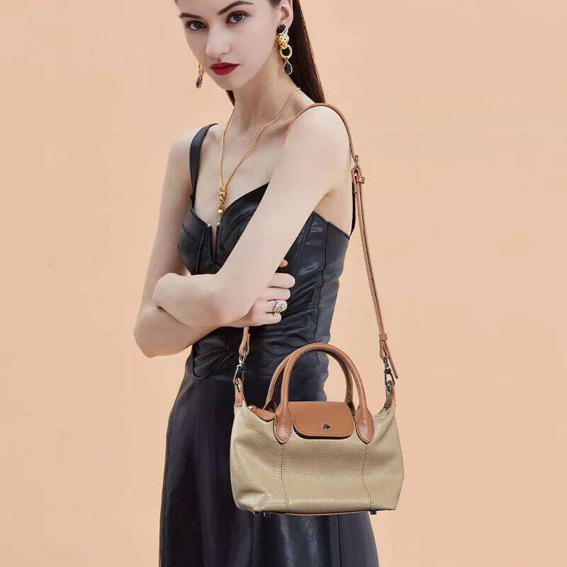 New top layer cowhide fashionable dumpling bag high-quality leather with contrasting colors large capacity handbag for women