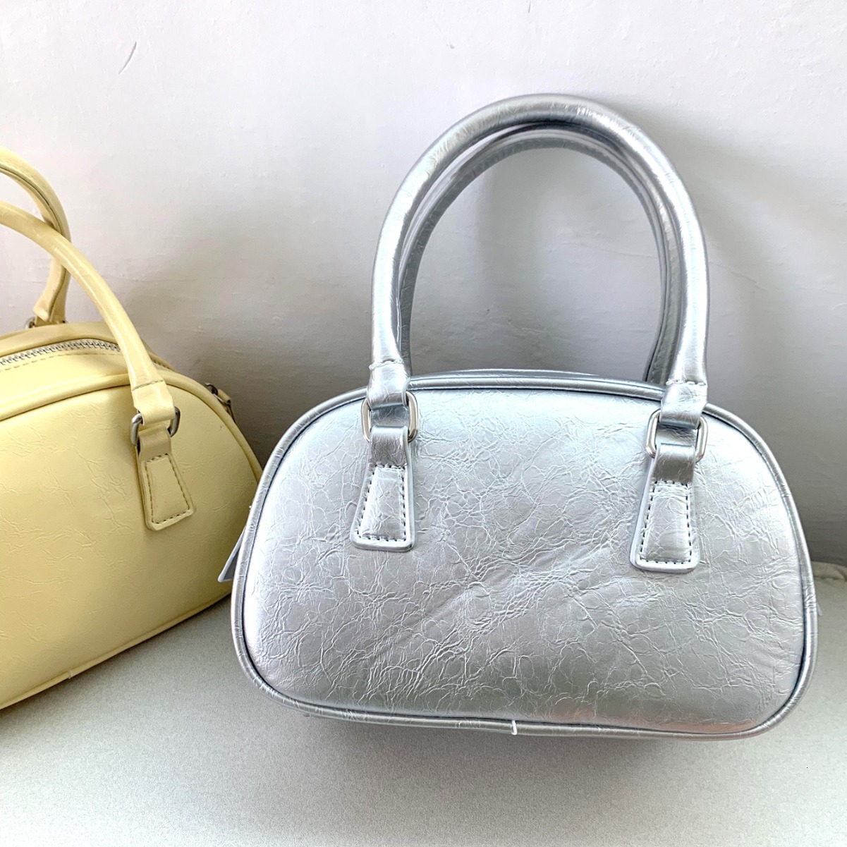designer 2025 New PU Texture Silver Bag Polyester Small Square Bag Fashion Versatile Handbag Crossbody Bowling Ball Small Bag