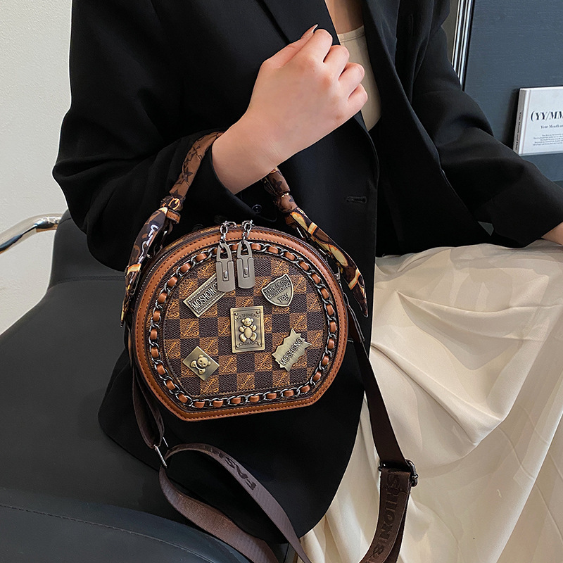 High end fashion womens small round bag 2025 new printed handbag casual versatile single shoulder diagonal cross bag