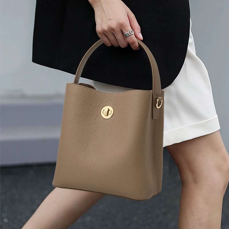 Elegant retro hand-carried water bucket top layer cowhide multi-layered strap lock tote bag single shoulder cross-body
