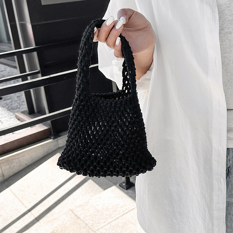 designer Korean Style Niche Hollow Mesh Handbag Handwoven Wrist Bag Fashion Versatile Beach Vacation Tote Bag Trendy