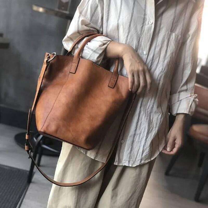 2025 First layer leather female vintage casual bucket Korean version hand bag shoulder crossbody bags cowhide