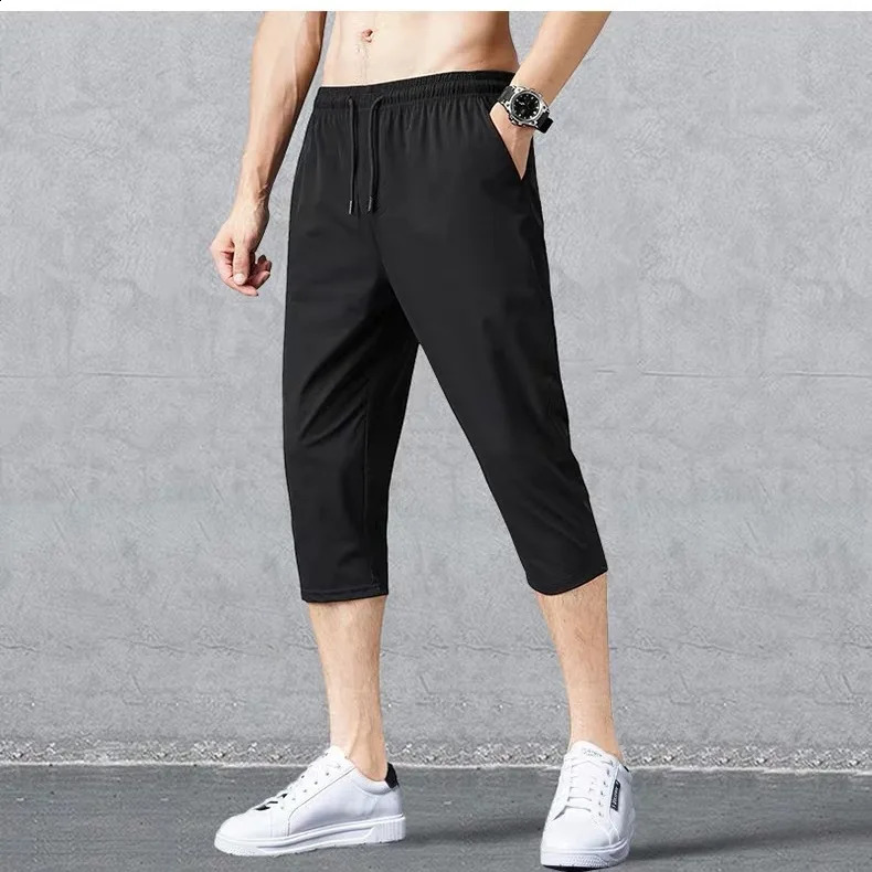 2025 Summer Mens Shorts Breathable Stretched Nylon Ice Silk 3/4 Short Capris Pants Sports Breeches Plus Size Casual Shorts Male 250530