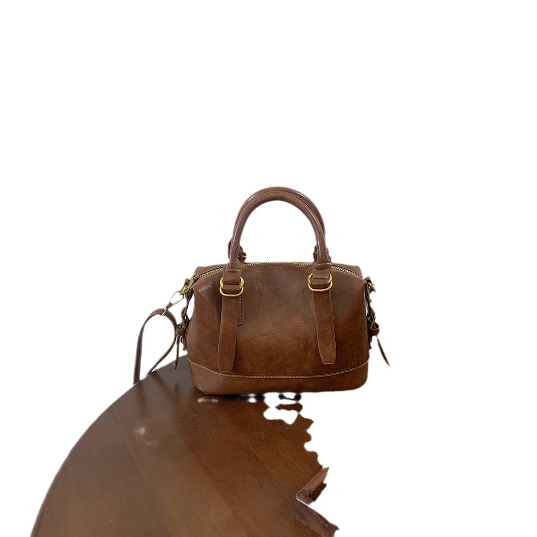 designer Versatile Handheld Bowling Ball Bag for Women 2025 Autumn Winter New Retro Fashion Pillow Bag Commuter Shoulder Crossbody Bag