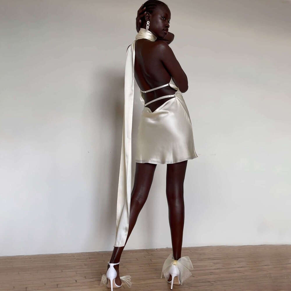 New European American with feminine feel, featuring a backless short skirt adjustable neck hanging satin dress This versatile and trendy new outfit fr