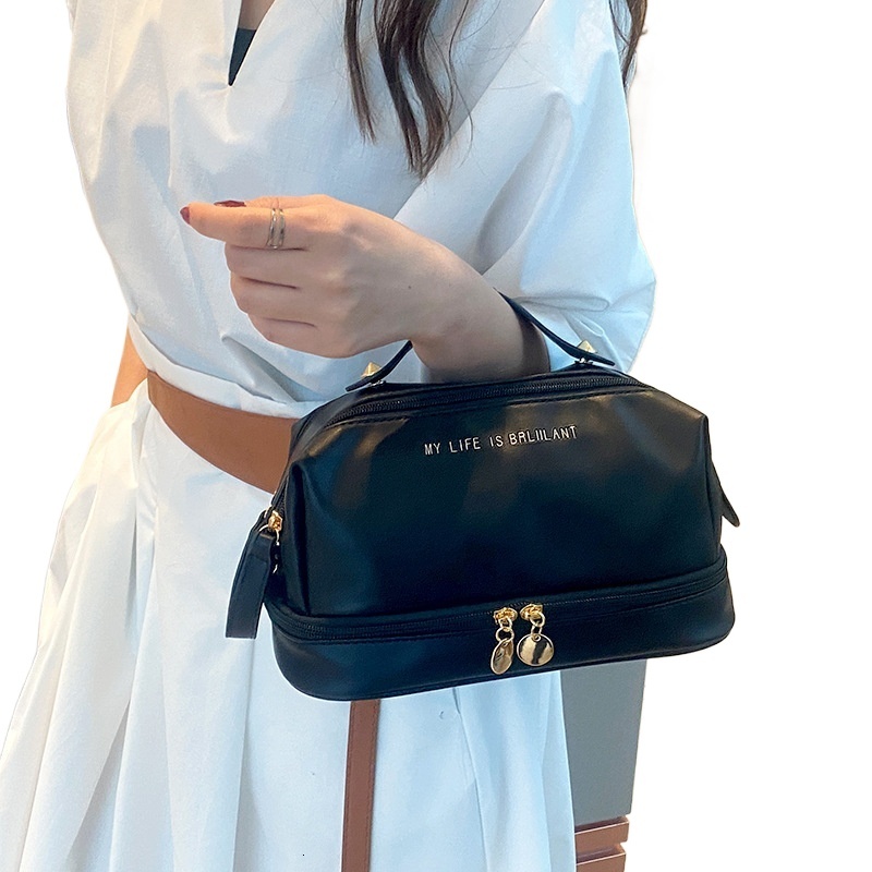 designer 2025 New PU Leather Handheld Makeup Bag Large Capacity Divider Board Skincare Storage Bag Simple Waterproof To