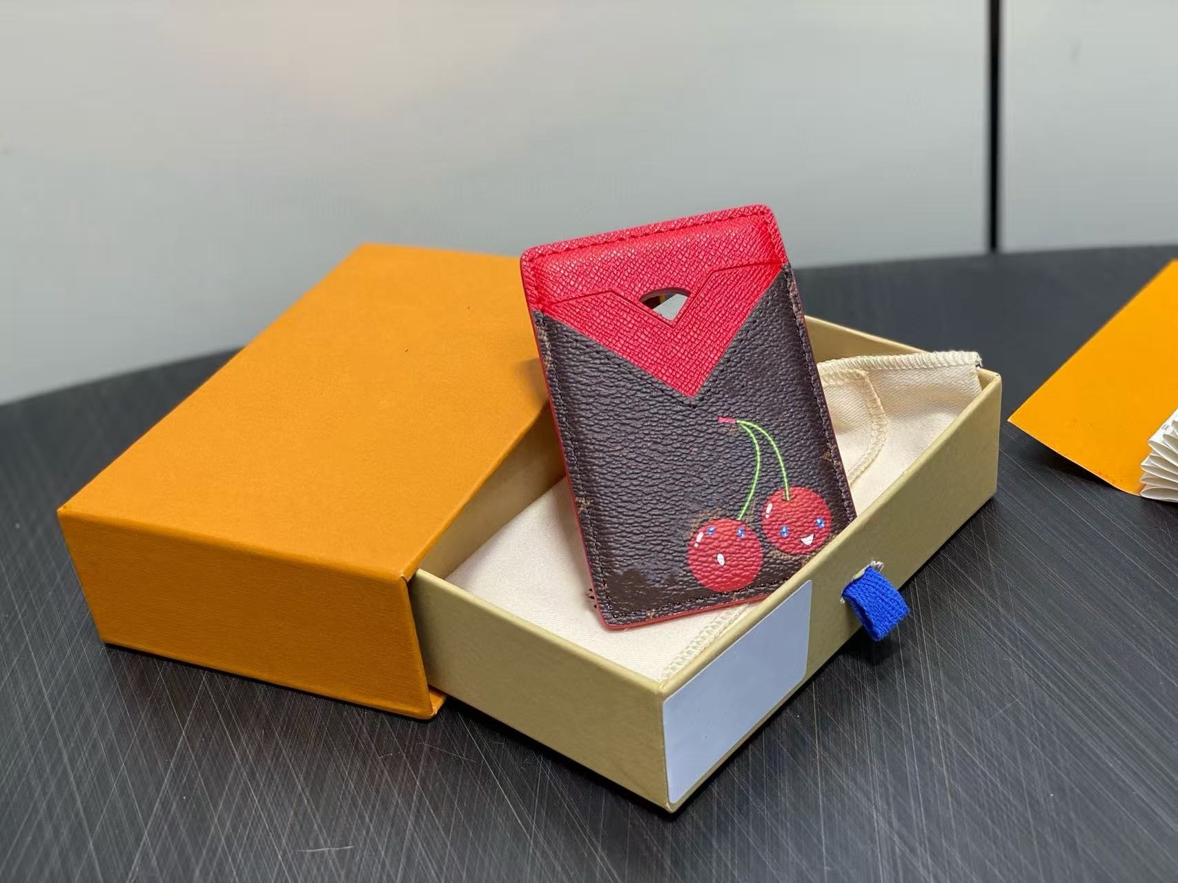 Top cherry magnetic phone card holder with red color blocking and top-quality m14562