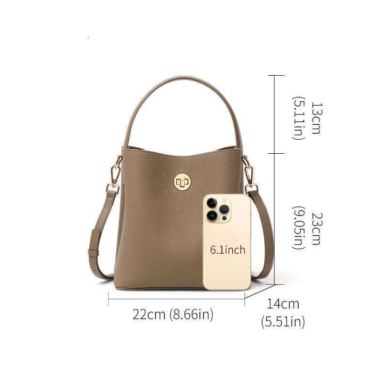 Elegant retro hand-carried water bucket top layer cowhide multi-layered strap lock tote bag single shoulder cross-body