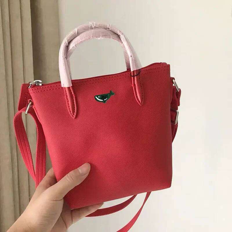 Mini French New Short Handle Mobile Phone Women's Single Shoulder Slant Cross Dumpling Small Tote Bag