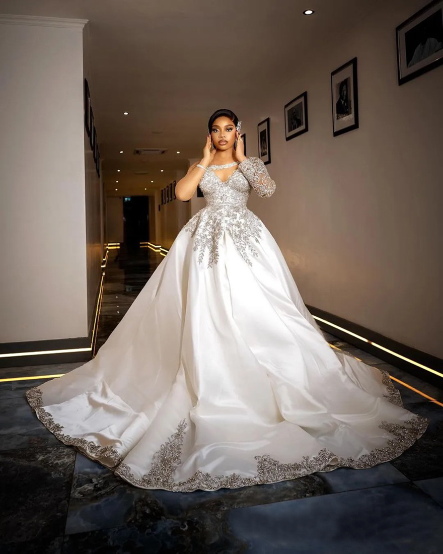 2025 African A-Line Wedding Dress Bridal Gowns for Bride Illusion Sheer Neck Long Sleeves Appliqued Beaded Rhinestones Crystals Satin Wedding Gowns Fo