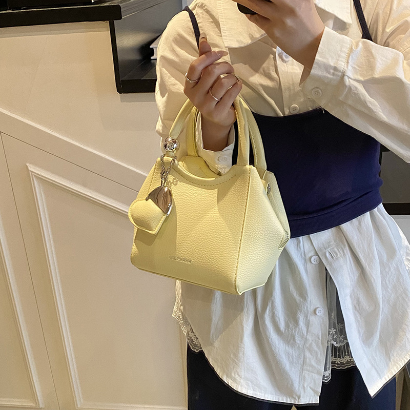 2025 Super Popular Yellow Handbag Small Free Shipping Tote Bag For Women Light Luxury Niche High-end Versatile Designer Bag Stylish Shoulder Crossbody