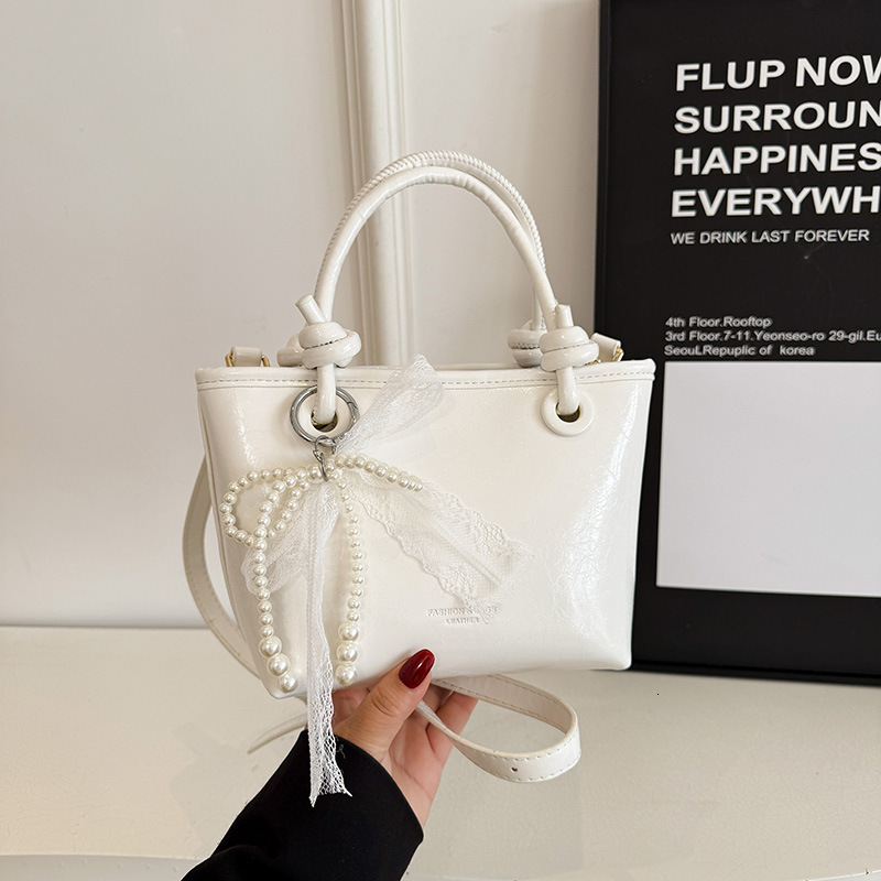 Cross border Korean fashion style women fashion s simple handbag new multifunctional leisure commuting designer women s shoulder bag