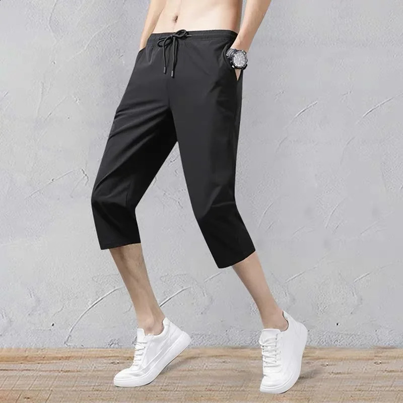 2025 Summer Mens Shorts Breathable Stretched Nylon Ice Silk 3/4 Short Capris Pants Sports Breeches Plus Size Casual Shorts Male 250530