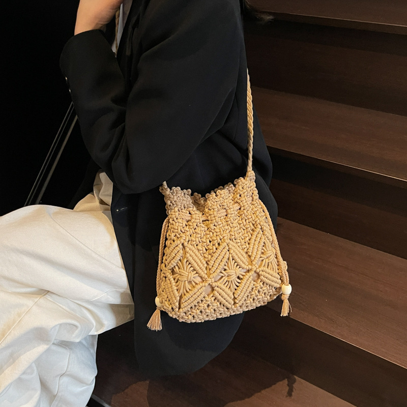 designer Woven Cotton Rope Bag for Women Summer Versatile 2025 New Fashion Niche Design Crossbody Bucket Bag Hollow Beach Bag