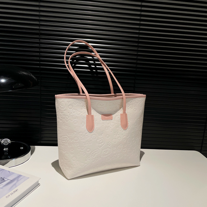 Top brand high-quality new free designer bag cute embossed large capacity handbag 2025 fashion trend multifunctional color block shoulder bag new free