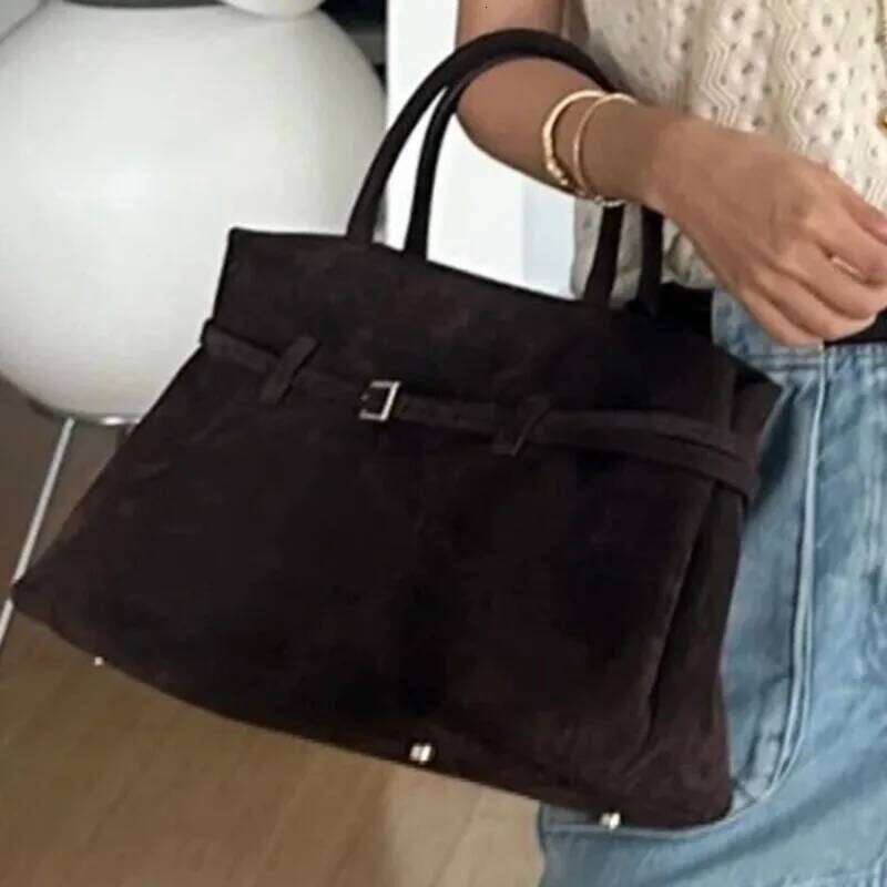 Fashionable new suede women's arrow shoulder hand-held tote bag