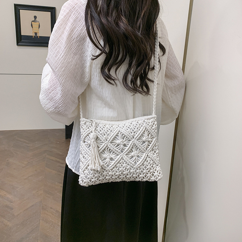 designer 2025 New Cotton Thread Tassel Woven Bag Quilted Clutch Casual Shoulder Straw Bag Versatile Women's Bag Beach Bag