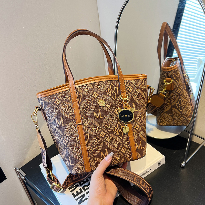 High Quality New Free Designer Bag 2024 Summer New Cat Print Bucket Fashionable Commuting Multifunctional Single Shoulder Crossbody Bag