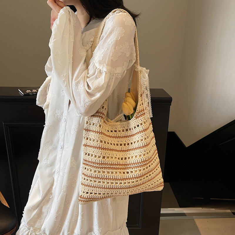 designer Casual Large Capacity Bucket Bag for Women 2025 Summer New Knitted Hollow Underarm Bag Striped Versatile Commuter Shoulder Bag