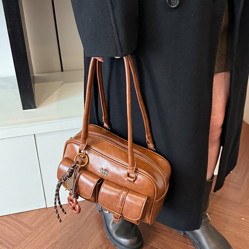 Top brand high-quality new free designer bag high-end retro large capacity bag 2025 new fashionable bowling bag one shoulder armpit handbag new free d