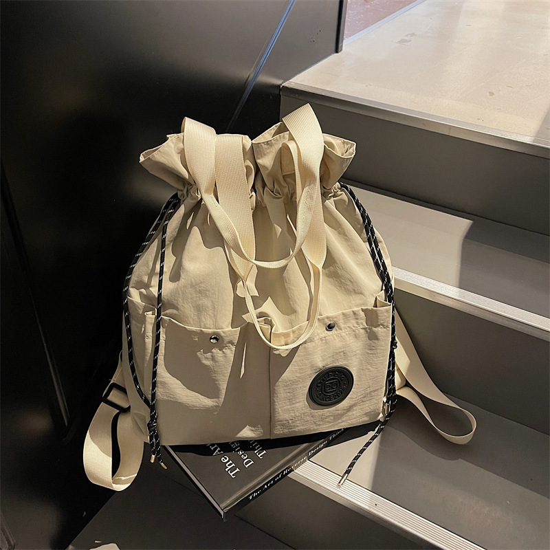 Lightweight Backpack for Women, New Drawstring Pocket Travel Bag, College Student Backpack, Casual Handheld and Crossbody Bag