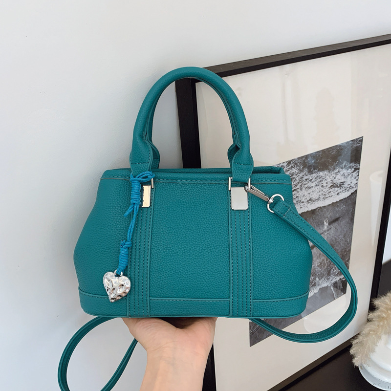 designer casual bag Versatile Handheld Bucket Bag for Women 2025 New Fashion Commuter Tote Bag Casual Textured Shoulder Crossbody Bag