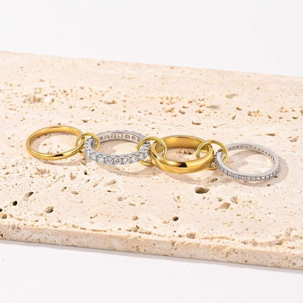 four inlaid with diamonds and zircon copper goldplated interlocking stacking rings special