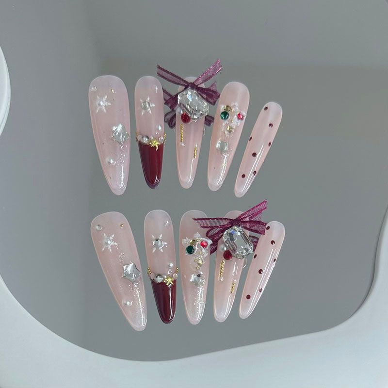 Wholesale Popular handmade nail art for Christmas snowflakes, French bows, luxurious and sparkling gemstones, diamonds, and gold princess nail art