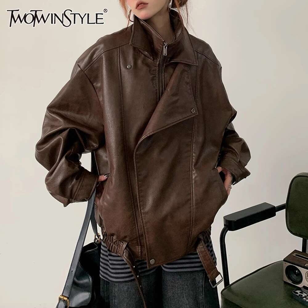 TWOTWINSTYLE Solid Spliced Zipper Loose Leather Jackets For Women Lapel Long Sleeve Patchwork Pockets Female Fashion Style New