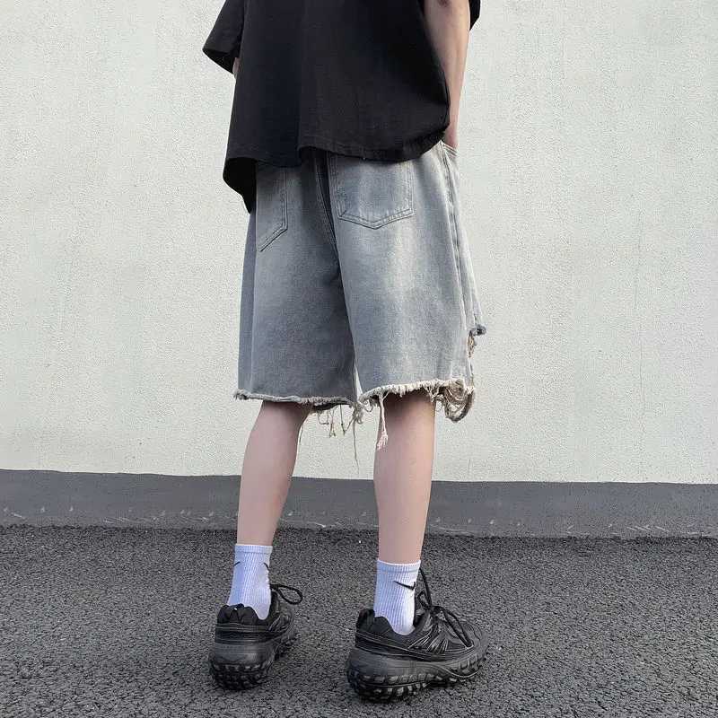 Mens Loose Wide-leg Retro Beggar Five-point Ripped Denim Shorts T250603