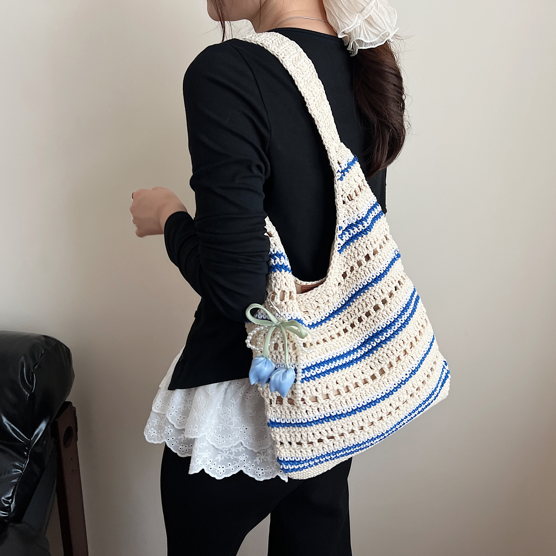 designer Niche Design Handwoven Bag 2025 New Striped Cotton Rope Women's Bag Trendy Hollow Handbag Shoulder Beach Bag