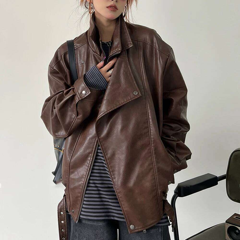 TWOTWINSTYLE Solid Spliced Zipper Loose Leather Jackets For Women Lapel Long Sleeve Patchwork Pockets Female Fashion Style New