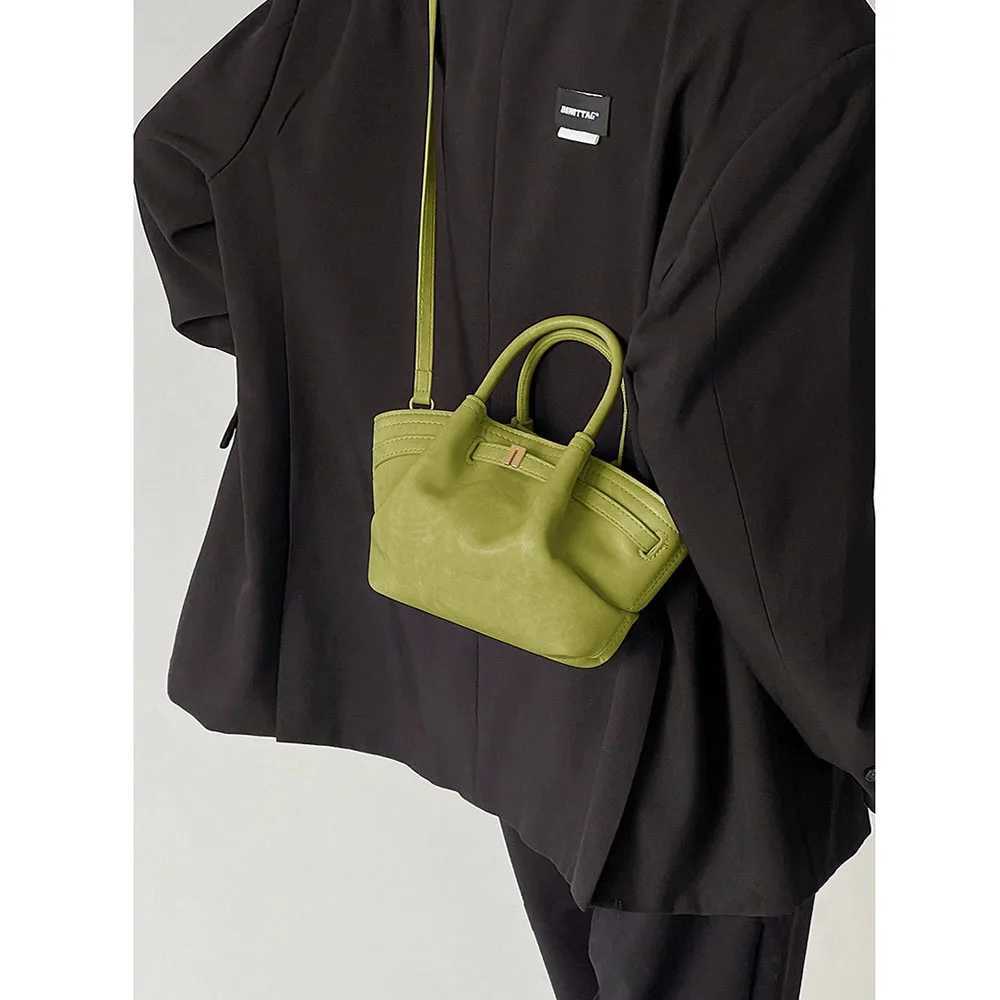 2025 Spring New Oil Wax Leather Casual Dumpling Bag Womens Fresh Pleated Commuters All-Matching Portable Messenger Bag W250602